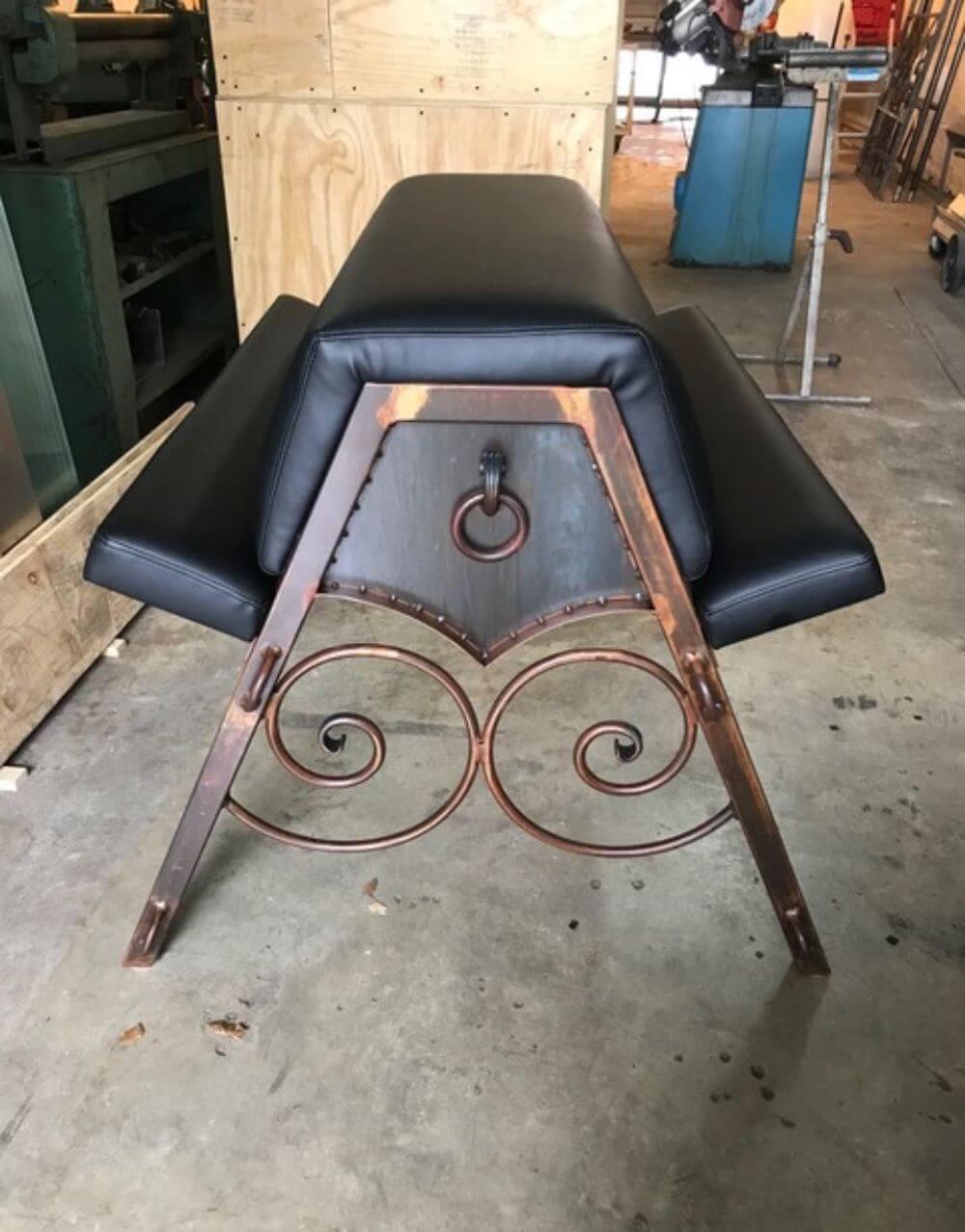Scroll Bondage Horse by Metalbound: a stylish and secure piece of bondage furniture featuring intricate scrollwork design, designed for stable and immersive restraint experiences.
