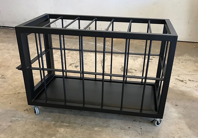 Back in Black Cage by Metalbound: a sleek and sturdy metal cage with a bold black finish, designed for secure and versatile bondage play.
