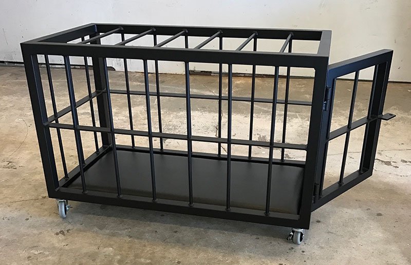 Back in Black Cage by Metalbound: a sleek and sturdy metal cage with a bold black finish, designed for secure and versatile bondage play.
