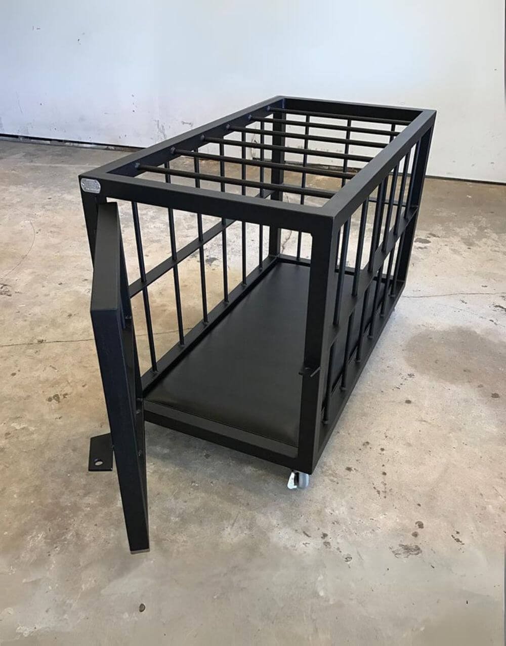 Back in Black Cage by Metalbound: a sleek and sturdy metal cage with a bold black finish, designed for secure and versatile bondage play.
