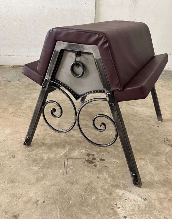 Scroll Bench by Metalbound with intricate hand-crafted steel scrolls and durable construction for versatile BDSM play.