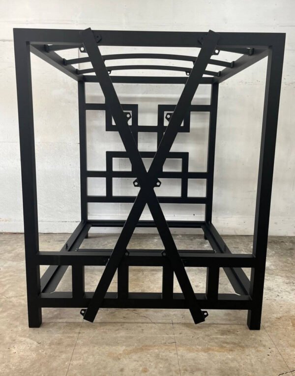 The East Meets West Bed by Metalbound: a stylish metal bed frame inspired by Eastern and Western design elements, featuring multiple attachment points for versatile bondage and restraint play.