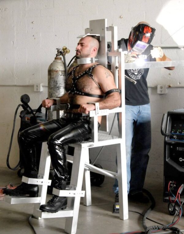 Bear Trap Chair by Metalbound: a sturdy and secure chair designed for intense and immersive restraint experiences, featuring robust construction and multiple attachment points.