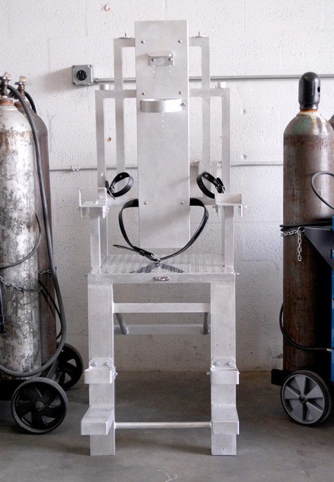 Bear Trap Chair by Metalbound: a sturdy and secure chair designed for intense and immersive restraint experiences, featuring robust construction and multiple attachment points.