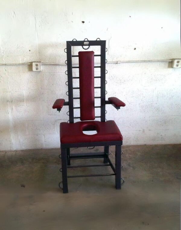 Executioner Chair by Metalbound: a sturdy and ominous chair designed for intense and immersive restraint experiences.