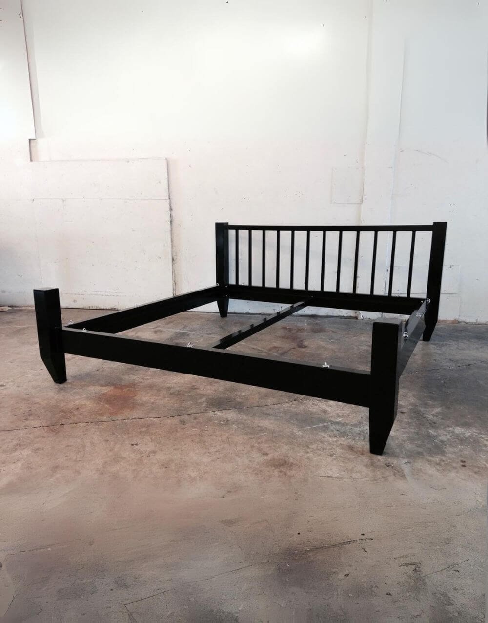 The Minimalist Bed by Metalbound: a sleek, low-profile metal bed frame with a clean, modern design, featuring discreet attachment points for versatile and secure bondage play.