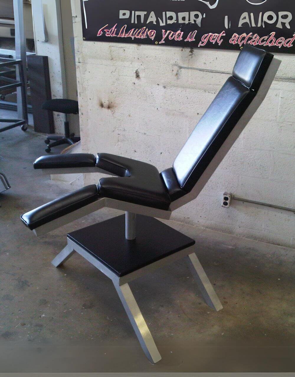 Birthing Chair with No Arms by Metalbound: a sturdy, arm-free chair designed for maximum accessibility, featuring secure attachment points for versatile bondage and restraint play.