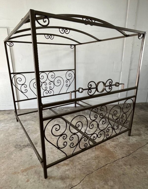 Scroll Bed by Metalbound with intricate hand-crafted steel scrolls and versatile attachment points for secure BDSM play. Includes removable stockade.